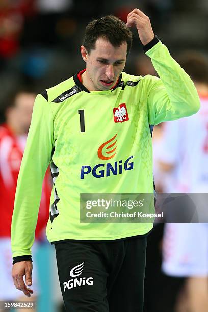 Slawomir Szmal of Poland looks dejected during the round of sixteen match between Hungary and Poland at Palau Sant Jordi on January 21, 2013 in...