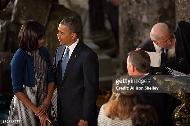 President Barack Obama shares a moment with first lady Michelle Obama at the Inaugural Luncheon in Statuary Hall on inauguration day at the U.S....