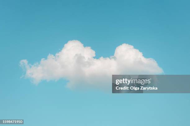 single cloud in blue sky. - cloud stock-fotos und bilder