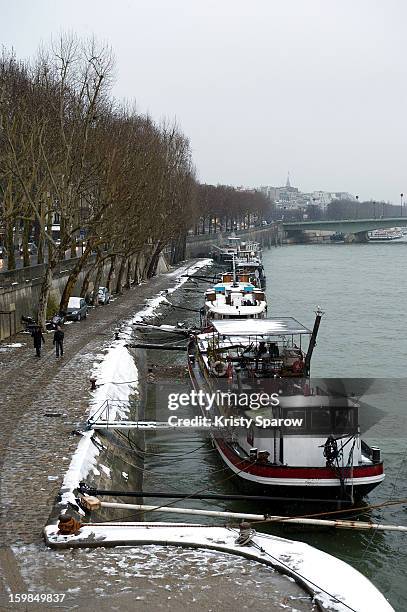 Snow covers the ground on January 21, 2013 in Paris, France. Heavy snowfall fell throughout Europe and the UK causing travel havoc and white layers...