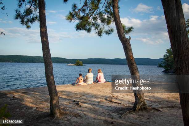 usa, new york state, hague, women and girl looking at lake george - adirondack mountains stock pictures, royalty-free photos & images