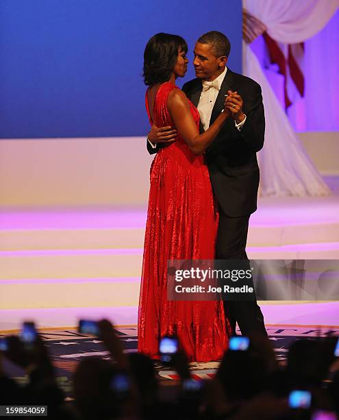 President Barack Obama and First Lady Michelle Obama dance during the Commander-In-Chief's Inaugural Ball January 21, 2013 in Washington, DC. Obama...