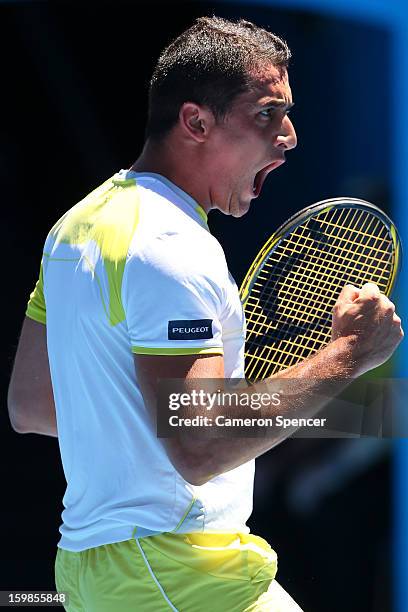 Nicolas Almagro of Spain celebrates winning a point in his Quarterfinal match against David Ferrer of Spain during day nine of the 2013 Australian...