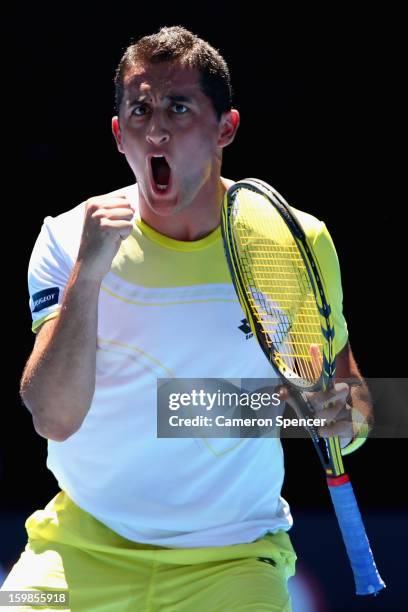 Nicolas Almagro of Spain celebrates winning a point in his Quarterfinal match against David Ferrer of Spain during day nine of the 2013 Australian...