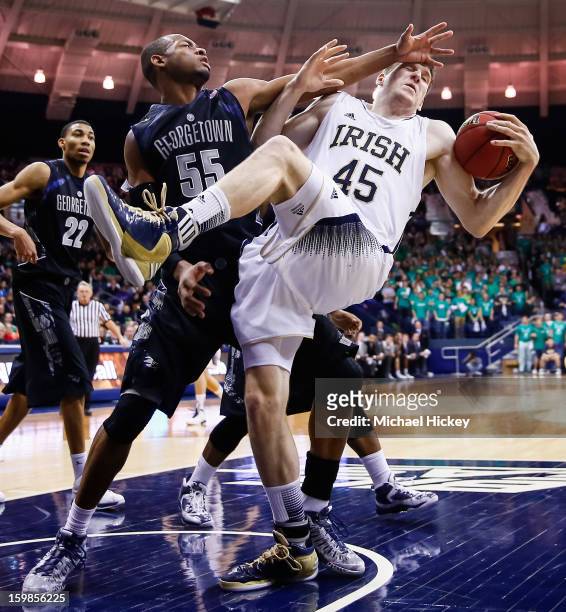 Jabril Trawick of the Georgetown Hoyas fouls Jack Cooley of the Notre Dame Fighting Irish in the head at Purcel Pavilion on January 21, 2013 in South...