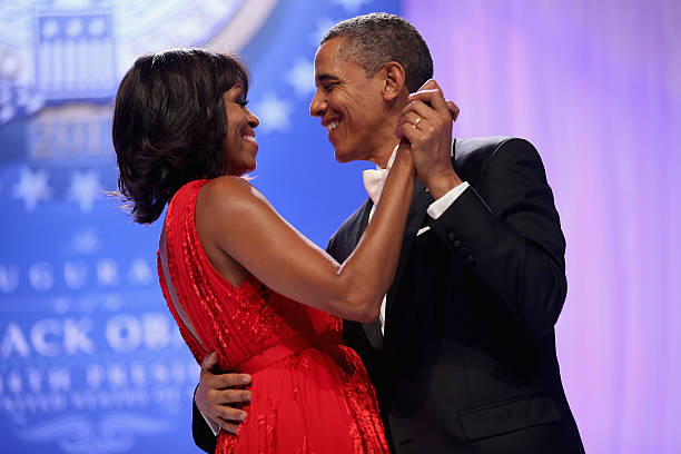 President Barack Obama and first lady Michelle Obama dance together during the Comander-in-Chief`s Inaugural Ball at the Walter Washington Convention...