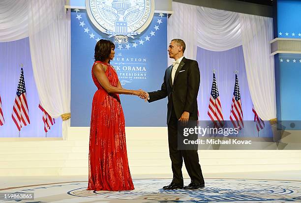 President Barack Obama and first lady Michelle Obama dance together during The Inaugural Ball at the Walter E. Washington Convention Center on...