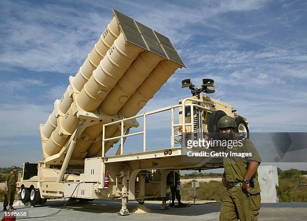 Battery of six Arrow missiles is raised into launch position at the Israeli Air Force's Palmahim base, as the anti-ballistic missile system is put on...