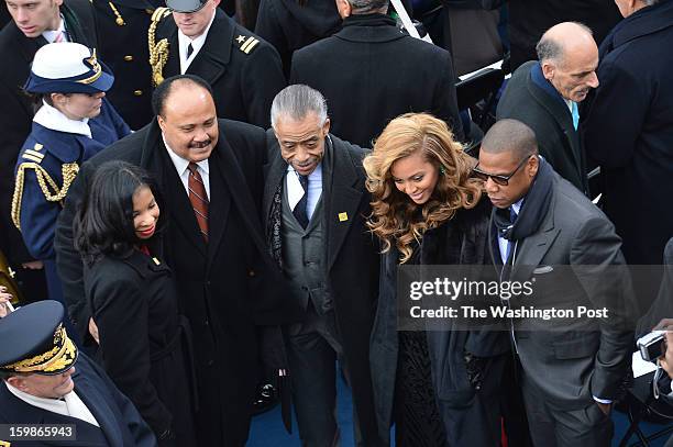 January, 21: Guests Andrea Waters, Martin Luther King III, Rev. Al Sharpton, Beyonce Knowles and her husband Jay-Z before the start of the 57th...