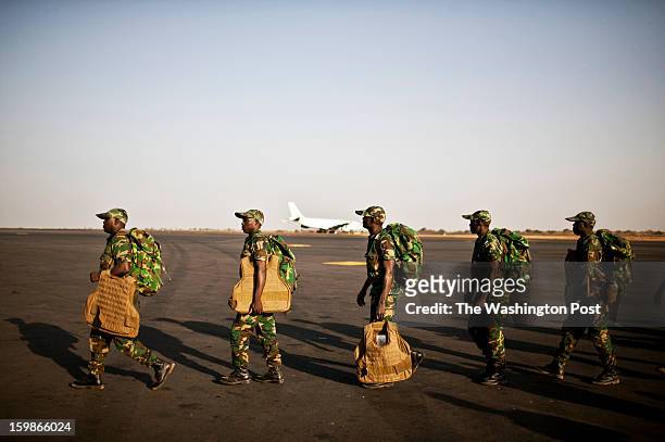 Soldiers from the West African Republic of Togo arrive at the airport in Bamako, Mali on Thursday, January 17, 2013. The troops arrived as part of a...