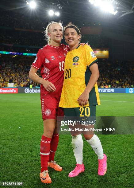 Sam Kerr of Australia and Pernille Harder of Denmark embrace following the FIFA Women's World Cup Australia & New Zealand 2023 Round of 16 match...