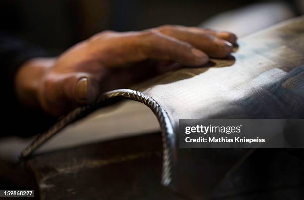 Piece of metal that will become part of a new suit of armour for the Vatican Swiss Guard is seen on January 21, 2013 in Molln, Austria. The Vatican...