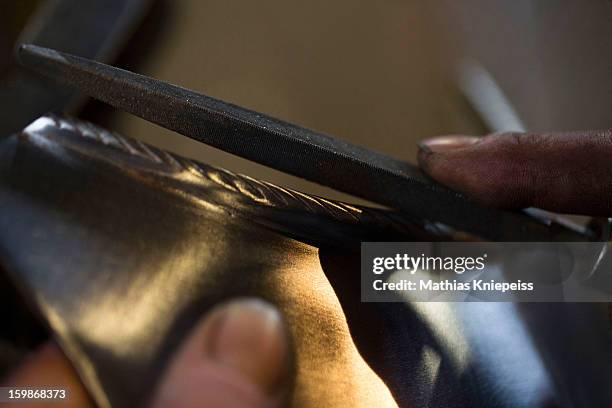 Piece of metal that will become part of a new suit of armour for the Vatican Swiss Guard is seen on January 21, 2013 in Molln, Austria. The Vatican...