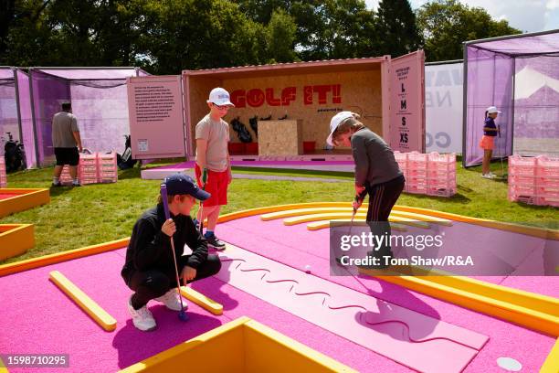 Local school children enjoy Golf.It in the Festival Village prior to the AIG Women's Open at Walton Heath Golf Club on August 07, 2023 in Tadworth,...