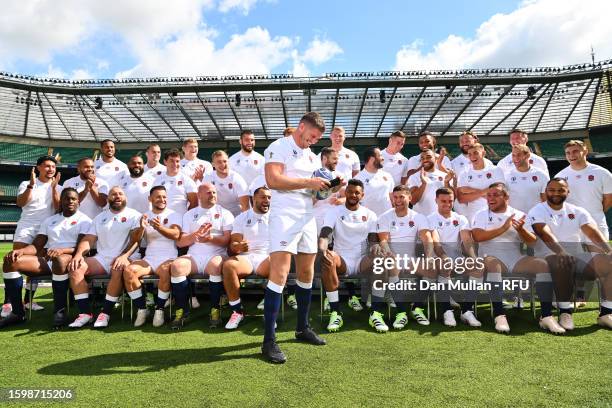 Owen Farrell of England shares a joke with his team mates during the England Rugby World Cup 2023 Squad Announcement at Twickenham Stadium on August...