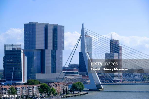 The 'Nieuwe Maas' river and 'De Rotterdam' a 149.1 m tall building and the 'Erasmusbrug' are seen on August 12, 2023 in Rotterdam, Netherlands. De...