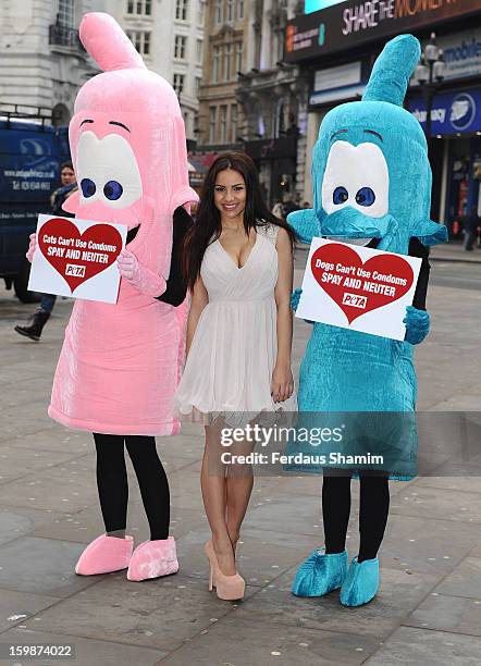 Lacey Banghard attends a photocall for PETA to encourage pet owners to have their cats and dogs sterilised at Picadilly Circus on January 22, 2013 in...