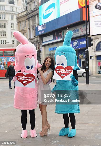 Lacey Banghard attends a photocall for PETA to encourage pet owners to have their cats and dogs sterilised at Picadilly Circus on January 22, 2013 in...