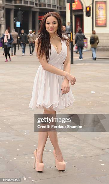 Lacey Banghard attends a photocall for PETA to encourage pet owners to have their cats and dogs sterilised at Picadilly Circus on January 22, 2013 in...