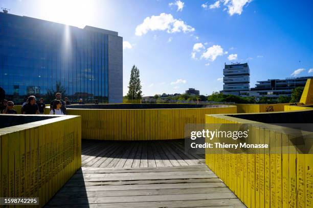 People enjoy the Luchtsingel , a 400-meter-long pedestrian bridge that runs through a building and across roads and railways to connect three...