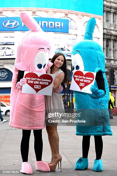 Lacey Banghard attends a photocall for PETA to encourage pet owners to have their cats and dogs sterilised at Picadilly Circus on January 22, 2013 in...