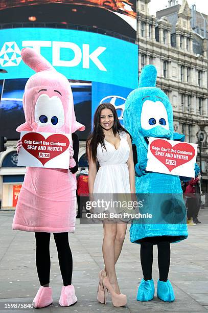 Lacey Banghard attends a photocall for PETA to encourage pet owners to have their cats and dogs sterilised at Picadilly Circus on January 22, 2013 in...