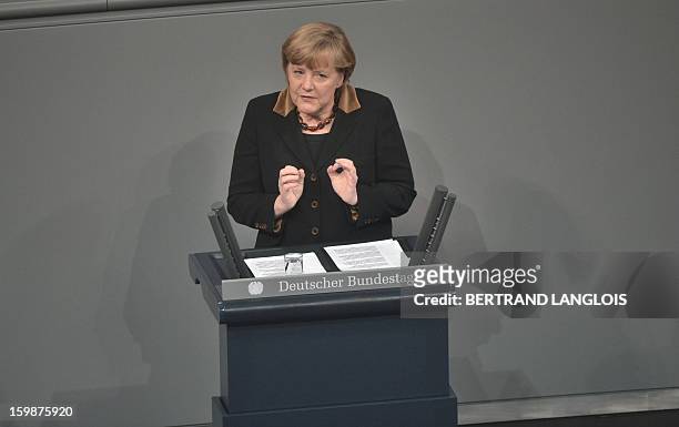 German Chancellor Angela Merkel delivers a speech as French National Assembly President Claude Bartolone and German Bundestag President Norbert...