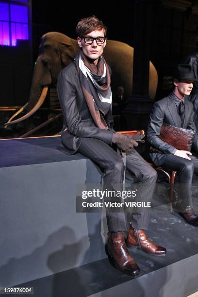Model presents the Berluti Ready to Wear Fall/Winter 2013-2014 presentation at the Great Gallery of Evolution in the National Museum of Natural...