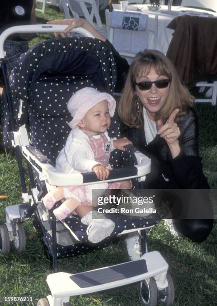 Actress Cassandra Peterson and daughter Sadie Pierson attend the Caring for Babies with AIDS' Fifth Annual Stroll-A-Thon on November 12, 1995 at...
