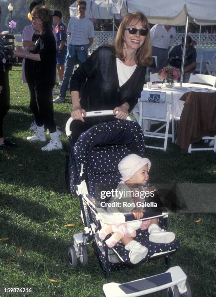 Actress Cassandra Peterson and daughter Sadie Pierson attend the Caring for Babies with AIDS' Fifth Annual Stroll-A-Thon on November 12, 1995 at...