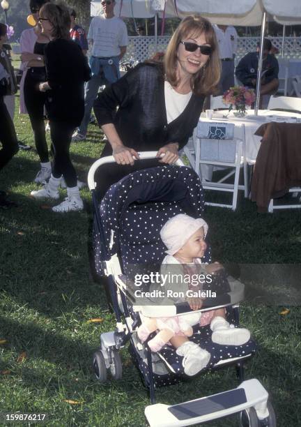 Actress Cassandra Peterson and daughter Sadie Pierson attend the Caring for Babies with AIDS' Fifth Annual Stroll-A-Thon on November 12, 1995 at...