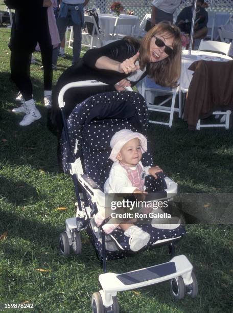 Actress Cassandra Peterson and daughter Sadie Pierson attend the Caring for Babies with AIDS' Fifth Annual Stroll-A-Thon on November 12, 1995 at...