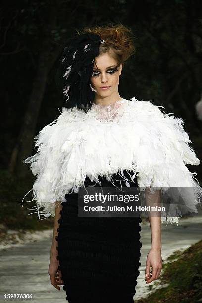 Model walks the runway during the Chanel Spring/Summer 2013 Haute-Couture show as part of Paris Fashion Week at Grand Palais on January 22, 2013 in...