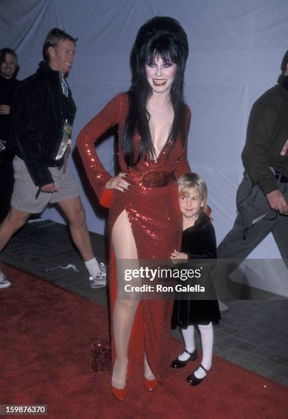 Actress Cassandra Peterson and daughter Sadie Pierson attend the 68th Annual Hollywood Christmas Parade on November 28, 1999 at Hollywood Boulevard...