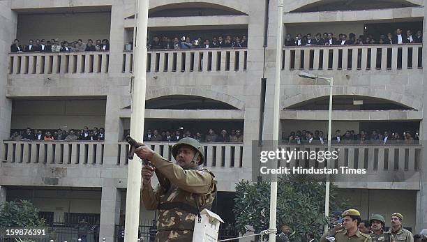 Police use tear gas to control supporters of INLD after a violence erupted outside Rohini Court in support of Om Prakash Chautala as court was giving...