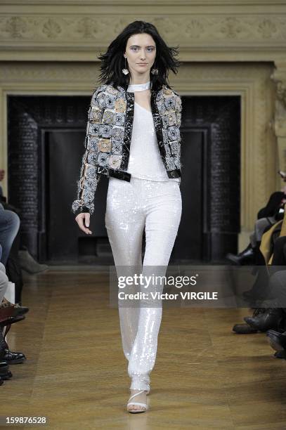 Model walks the runway during the Maurizio Galante Spring/Summer 2013 Haute-Couture show as part of Paris Fashion Week at Theatre du Chatelet on...