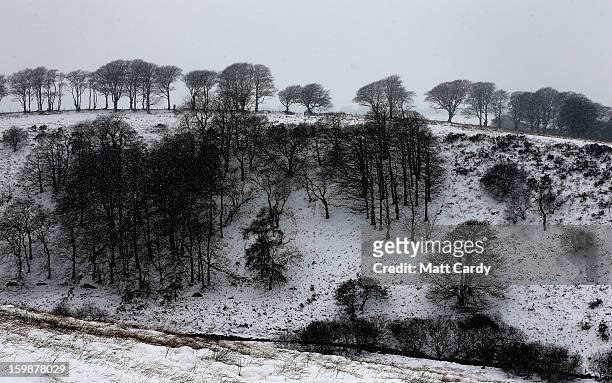 Snow covers fields near to Simonsbath on January 22, 2013 on Exmoor, England. Snow and ice is continuing to cause disruption to some parts of the UK...