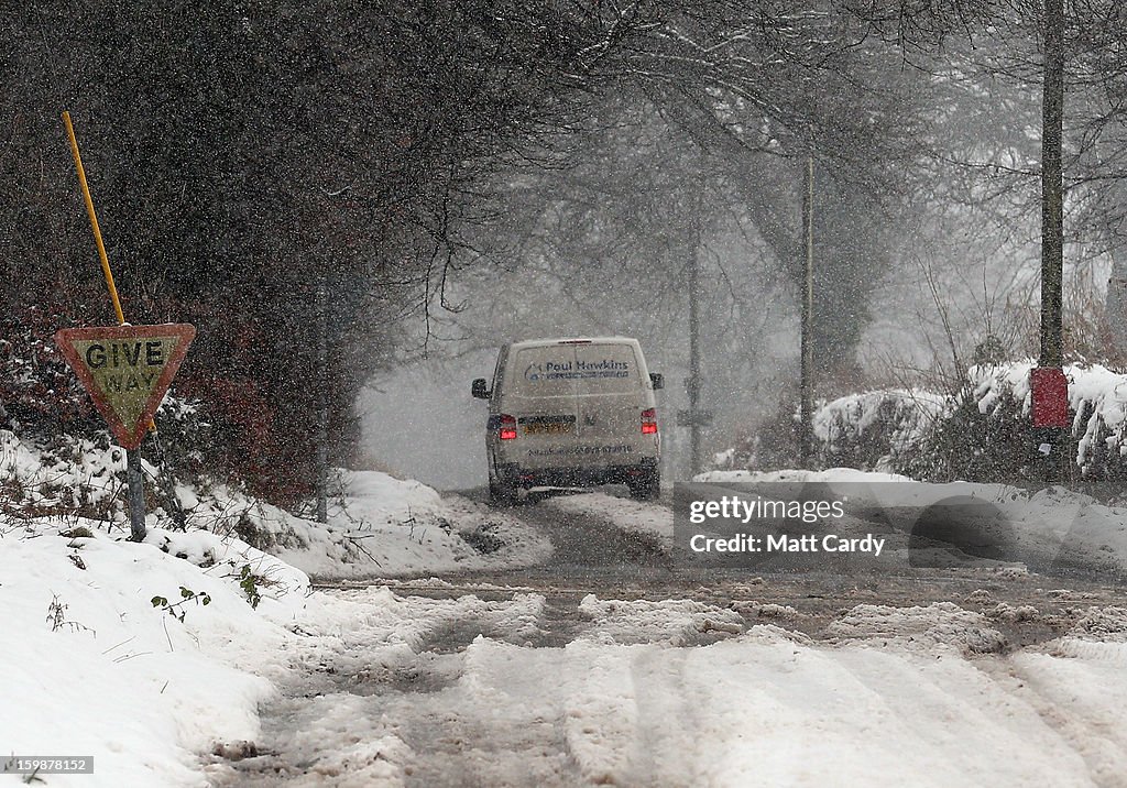 Snow Continues To Disrupt The UK's Road and Rail Networks