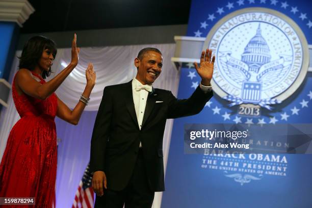 President Barack Obama and first lady Michelle Obama thank supporters during the Commander in Chief Inaugural Ball at the Walter E. Washington...