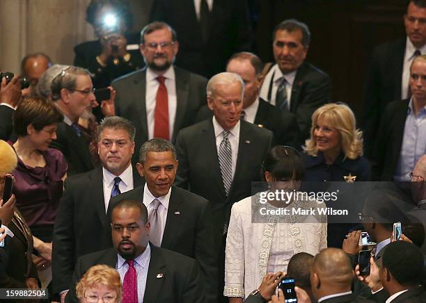 President Barack Obama and first lady Michelle Obama, Vice President Joseph Biden and Dr. Jill Biden, arrive at the National Prayer Service at the...