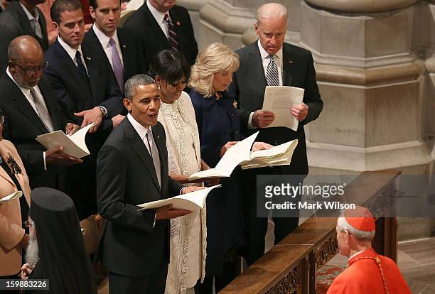President Barack Obama, first lady Michelle Obama, Dr. Jill Biden and Vice President Joseph Biden participate in the National Prayer Service at the...