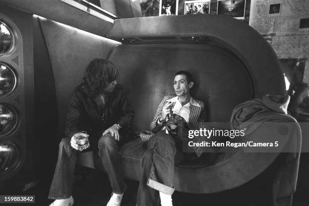 Mick Jagger and Charlie Watts of The Rolling Stones are photographed backstage in 1975 in San Antonio, Texas. CREDIT MUST READ: Ken Regan/Camera 5...