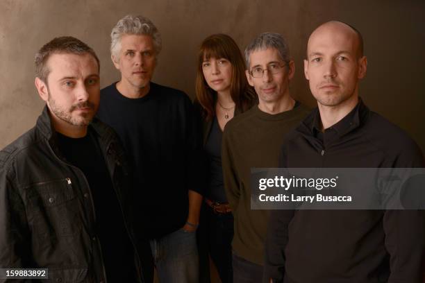 Writers Jeremy Scahill and David Riker, producers Brenda Coughlin and Anthony Arnove and director Rick Rowley pose for a portrait during the 2013...