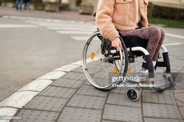 crossing the street - wheelchair accessibility stock pictures, royalty-free photos & images