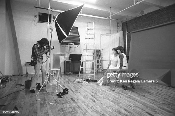 Mick Jagger and Keith Richards of the Rolling Stones are photographed being photographed by photographer Ken Regan, at the Camera 5 studios in 1977...