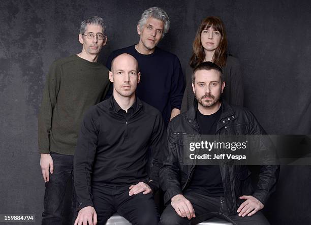 Producer Anthony Arnove, writer David Riker, producer Brenda Coughlin writers Rick Rowley, and Jeremy Scahill pose for a portrait during the 2013...