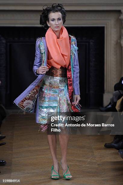 Model walks the runway during the Maurizio Galante show at Theatre du Chatelet on January 21, 2013 in Paris, France.