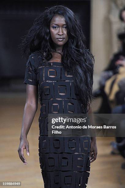 Model walks the runway during the Maurizio Galante show at Theatre du Chatelet on January 21, 2013 in Paris, France.