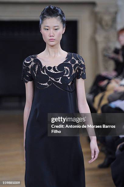 Model walks the runway during the Maurizio Galante show at Theatre du Chatelet on January 21, 2013 in Paris, France.