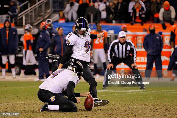 Justin Tucker of the Baltimore Ravens kicks a successful 47-yard game-winning field goal in the second overtime to win 38-35 against the Denver...